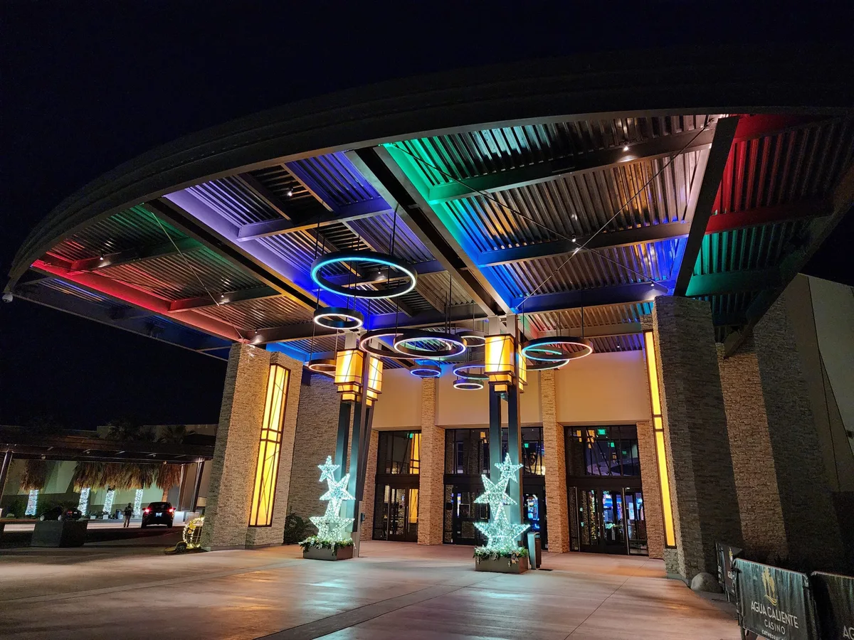 Agua Caliente Casino entrance lit up at night