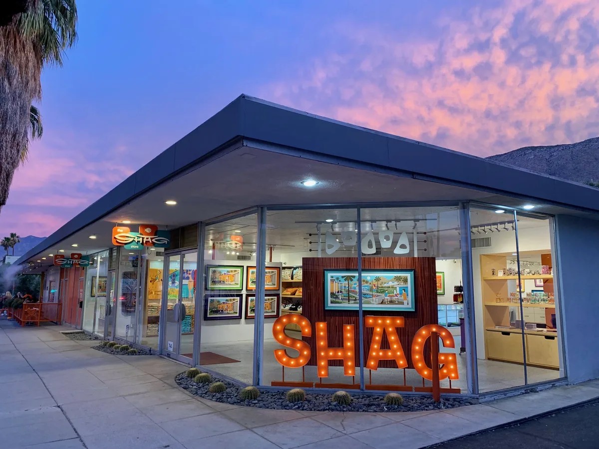 The Shag Store on Palm Canyon Drive at dusk